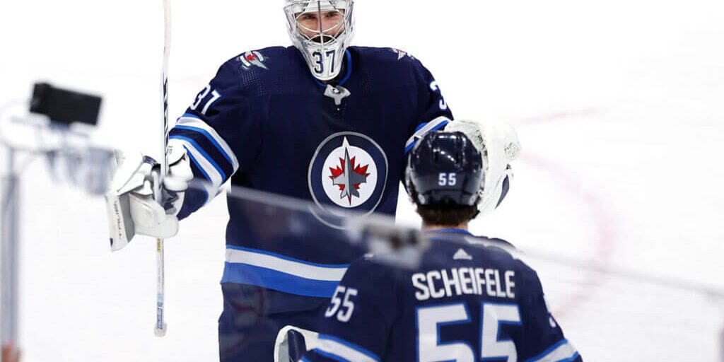 Jets sign Mark Scheifele, Connor Hellebuyck to 7-year extensions with $8.5 million AAV