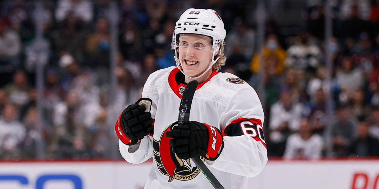 Nov 22, 2021; Denver, Colorado, USA; Ottawa Senators defenseman Lassi Thomson (60) celebrates after his goal in the first period against the Colorado Avalanche at Ball Arena. Mandatory Credit: Isaiah J. Downing-USA TODAY Sports